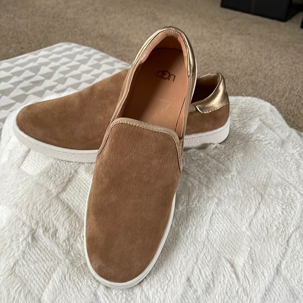 Ugg slip on sneaker.  Brand new without tags.  Sz 9 womens.